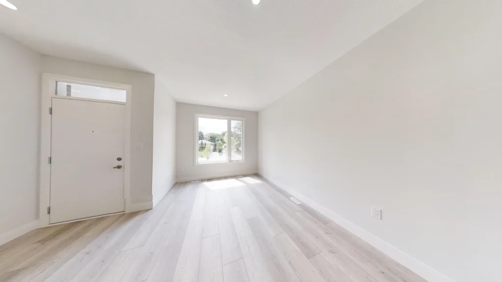 Nine-foot ceilings and pot lights in an Ironstone townhome living area