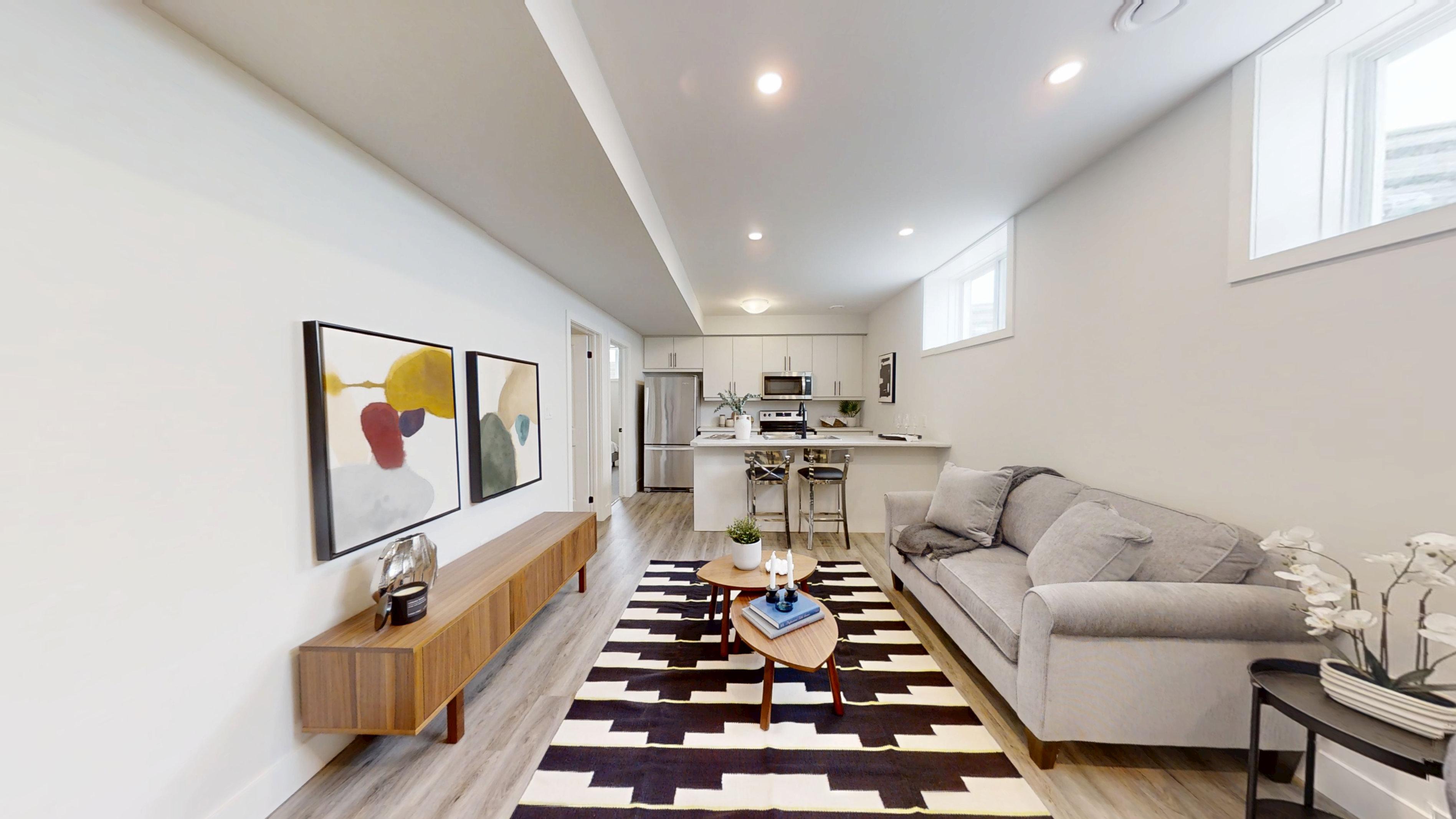 Nine-foot main floor ceilings and pot lights in an Ironstone living area